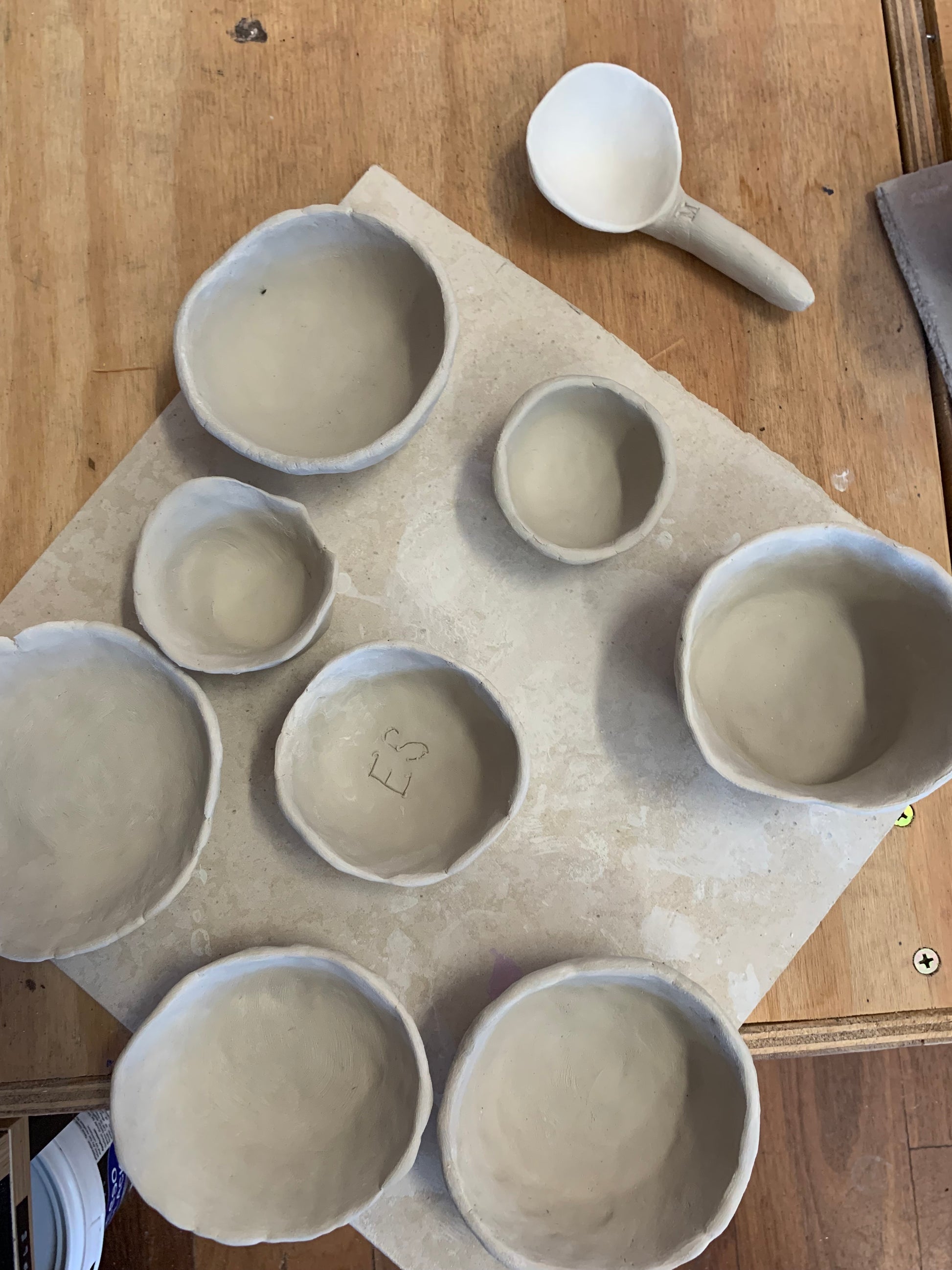 Birds eye view of 8 bowls of various sizes